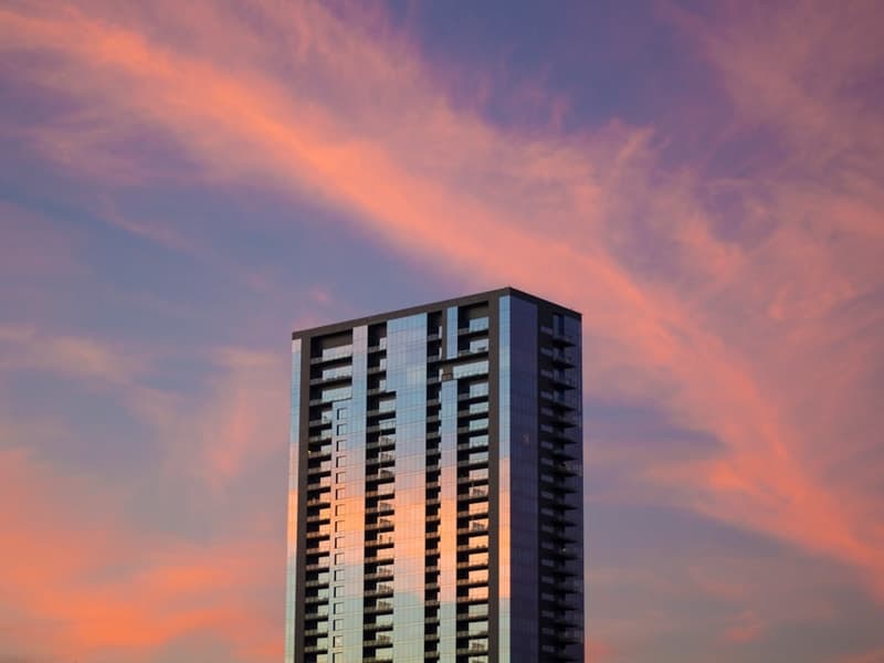 Downtown Austin - Urban Living in the Heart of Texas Modern downtown condo building lobby or exterior, sleek urban living in Downtown Austin